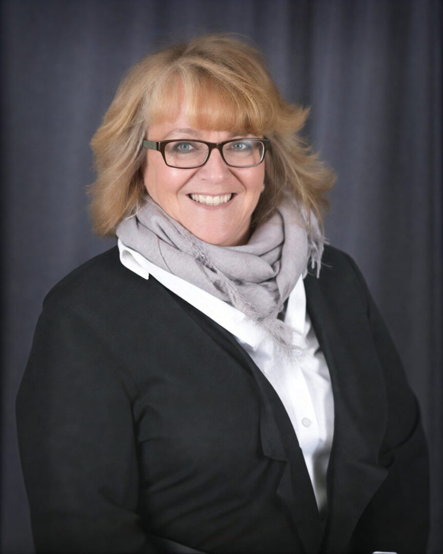 Professional woman with short blonde hair