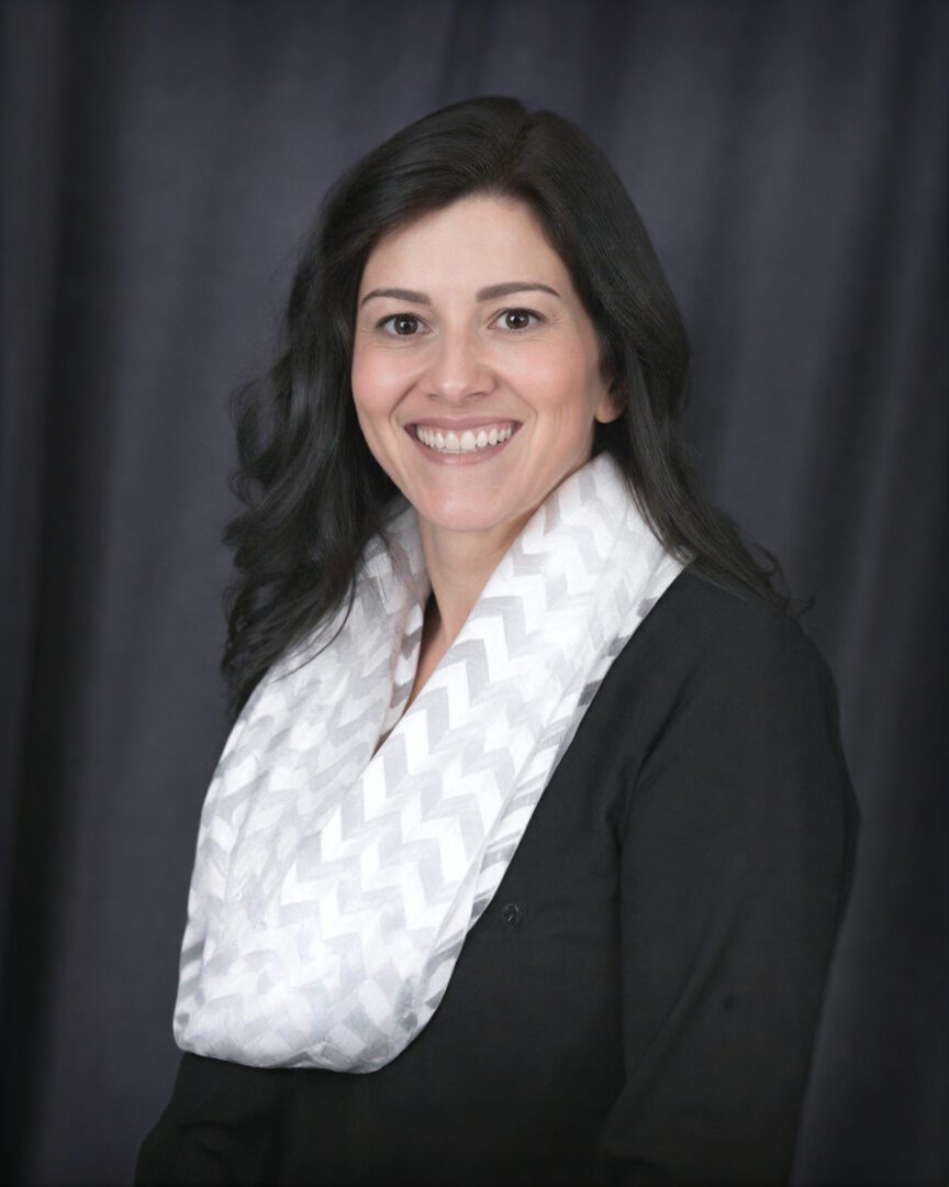 Smiling woman with long dark hair