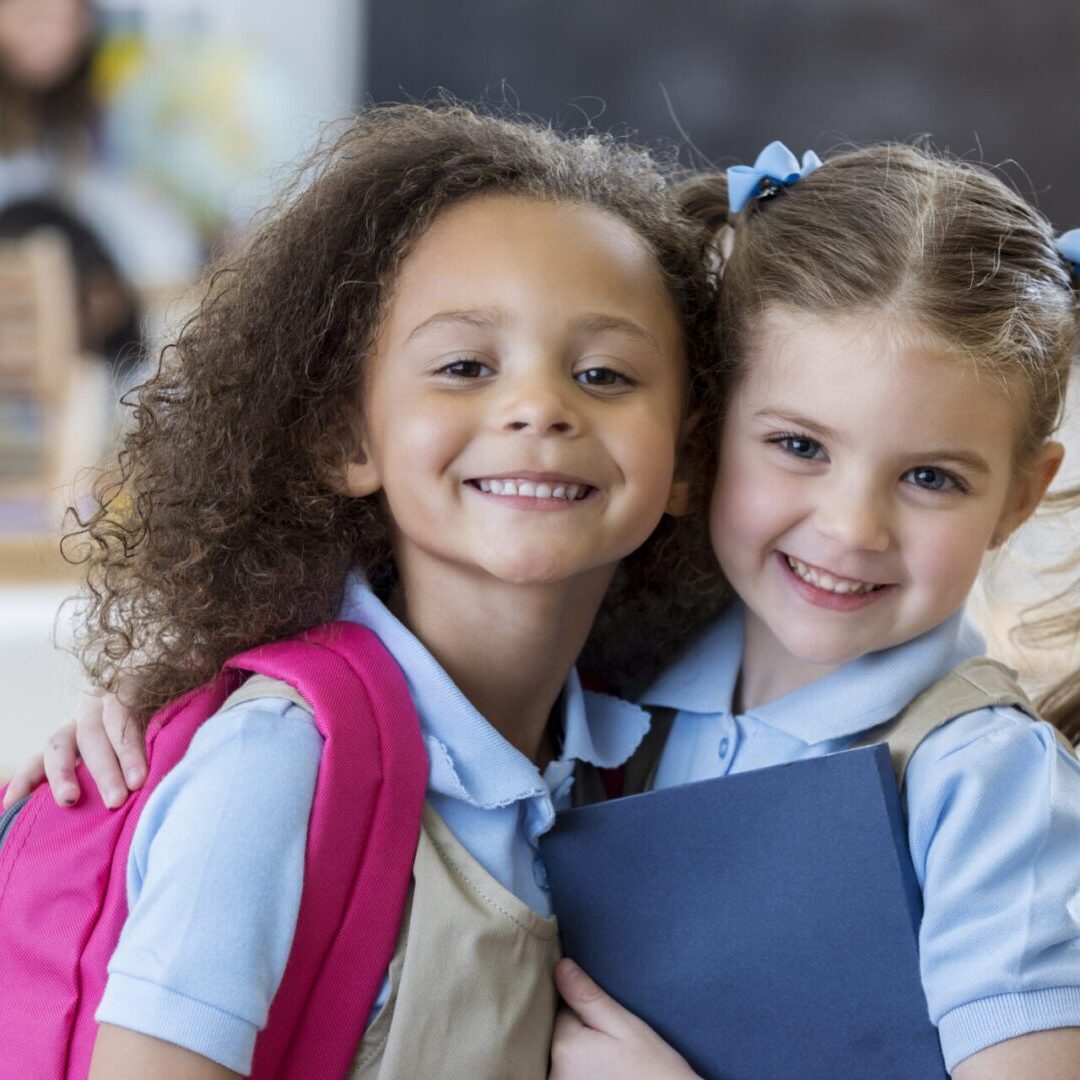 Happy kids in school uniforms